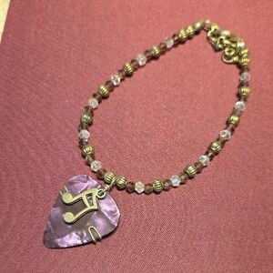 Purple Beaded Bracelet with Gold-Tone Musical Pick Pendant - Women Jewelry